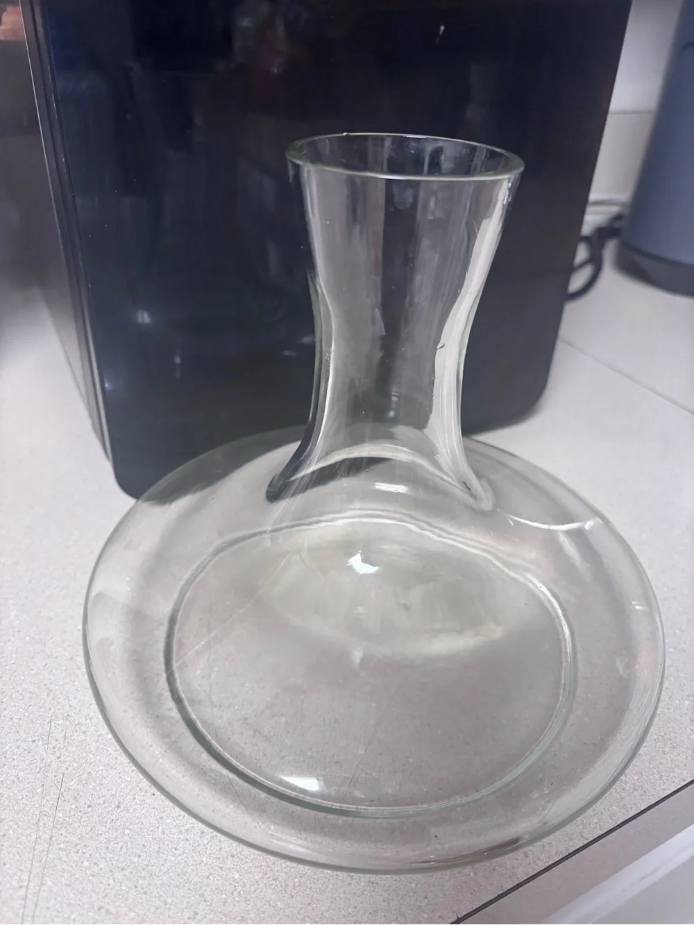 Glass vase with round base